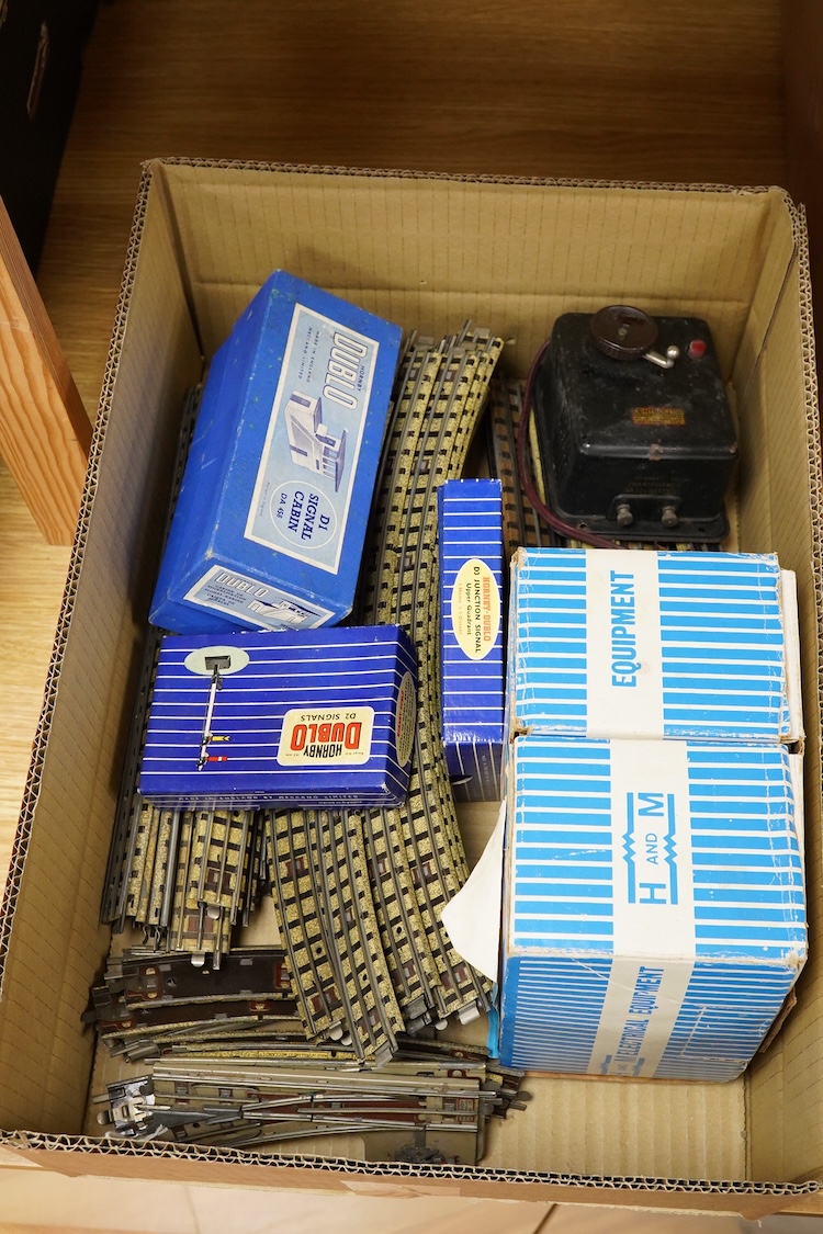 A collection of Hornby Dublo railway for 3-rail running, including two locomotives; an LMS Duchess of Athol 4-6-2, locomotive box, tender unboxed, and a boxed BR Standard Class 4 2-6-4T, 80054, together with five boxed b